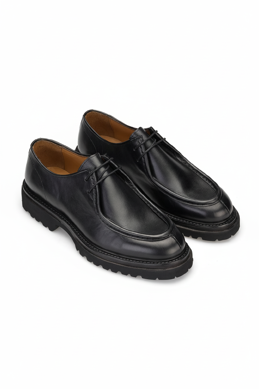 Vue de face des bottines à lacets noires Gianni & Armando en cuir souple