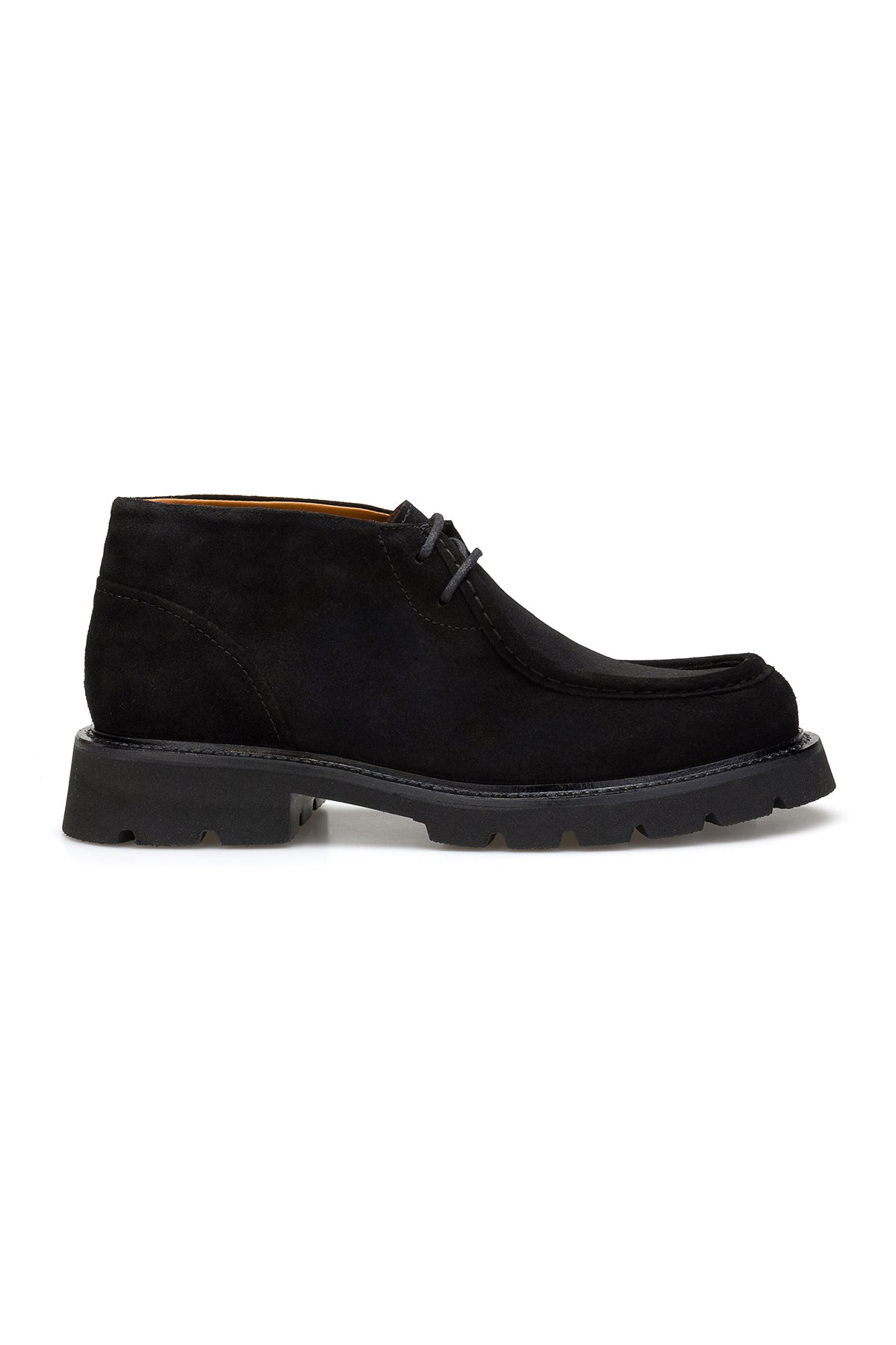 Close-up of Wildleder texture and leather insole inside the boot.