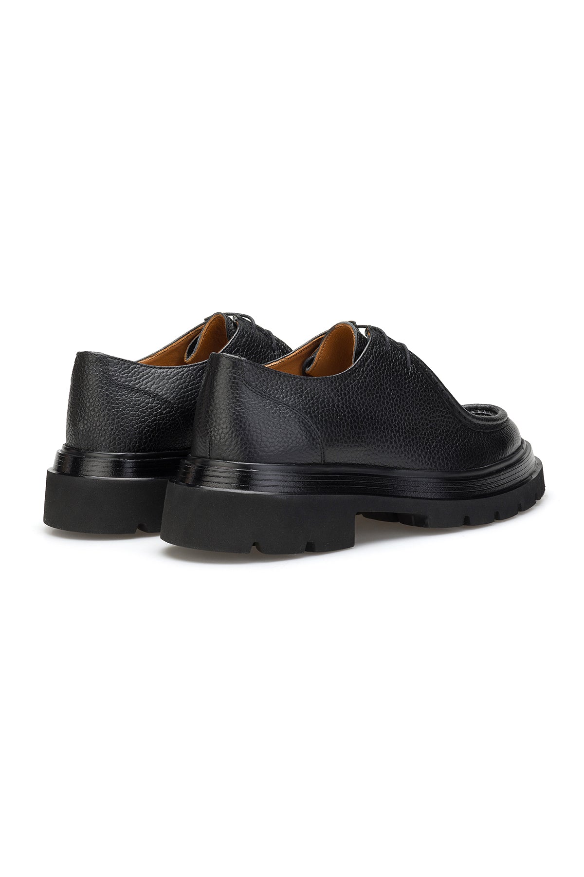 Vue arrière d'une bottine à lacets en cuir noir avec semelle EVA
