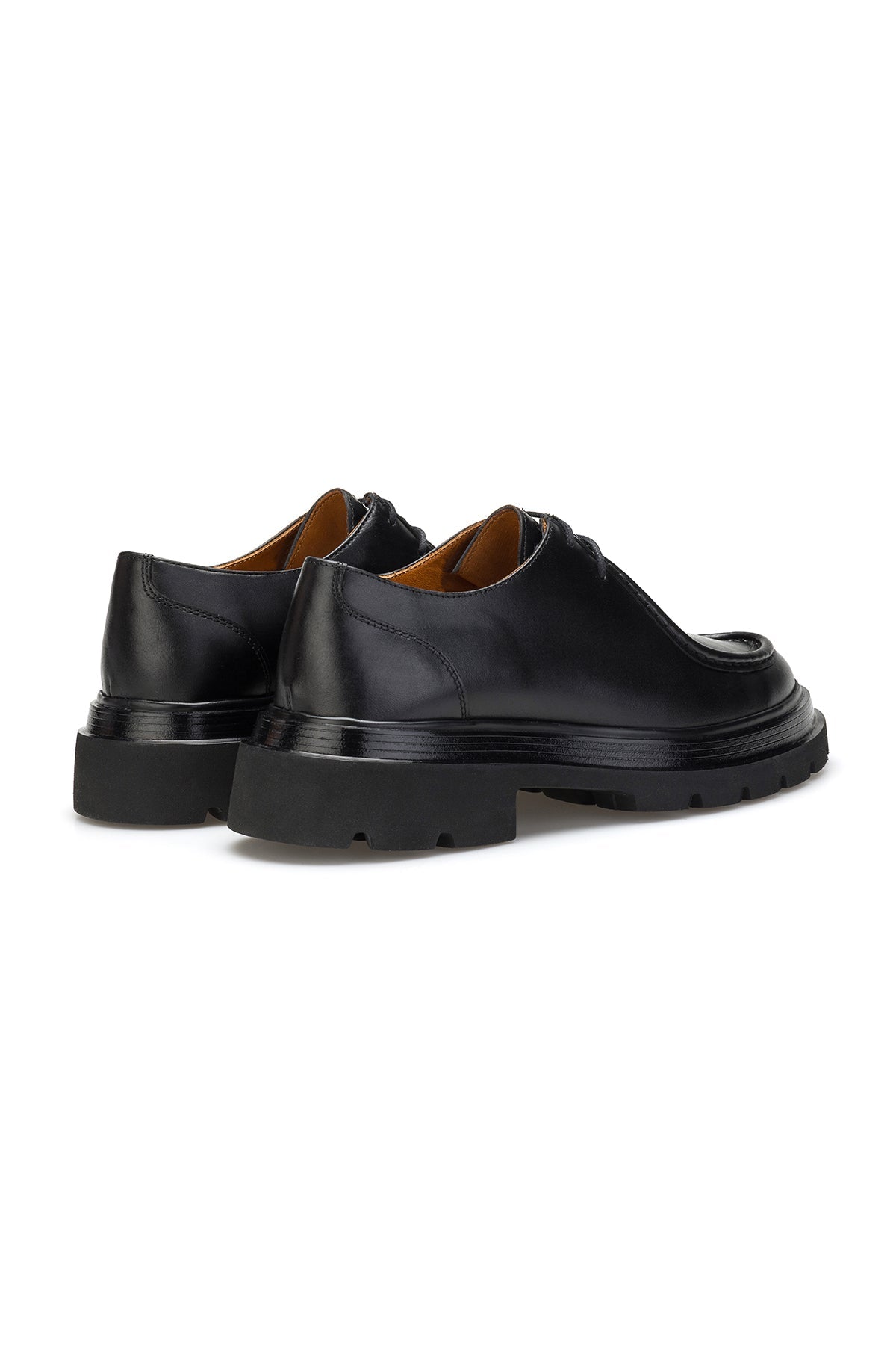 Vue arrière des bottines à lacets avec semelle EVA visible et première de propreté en cuir