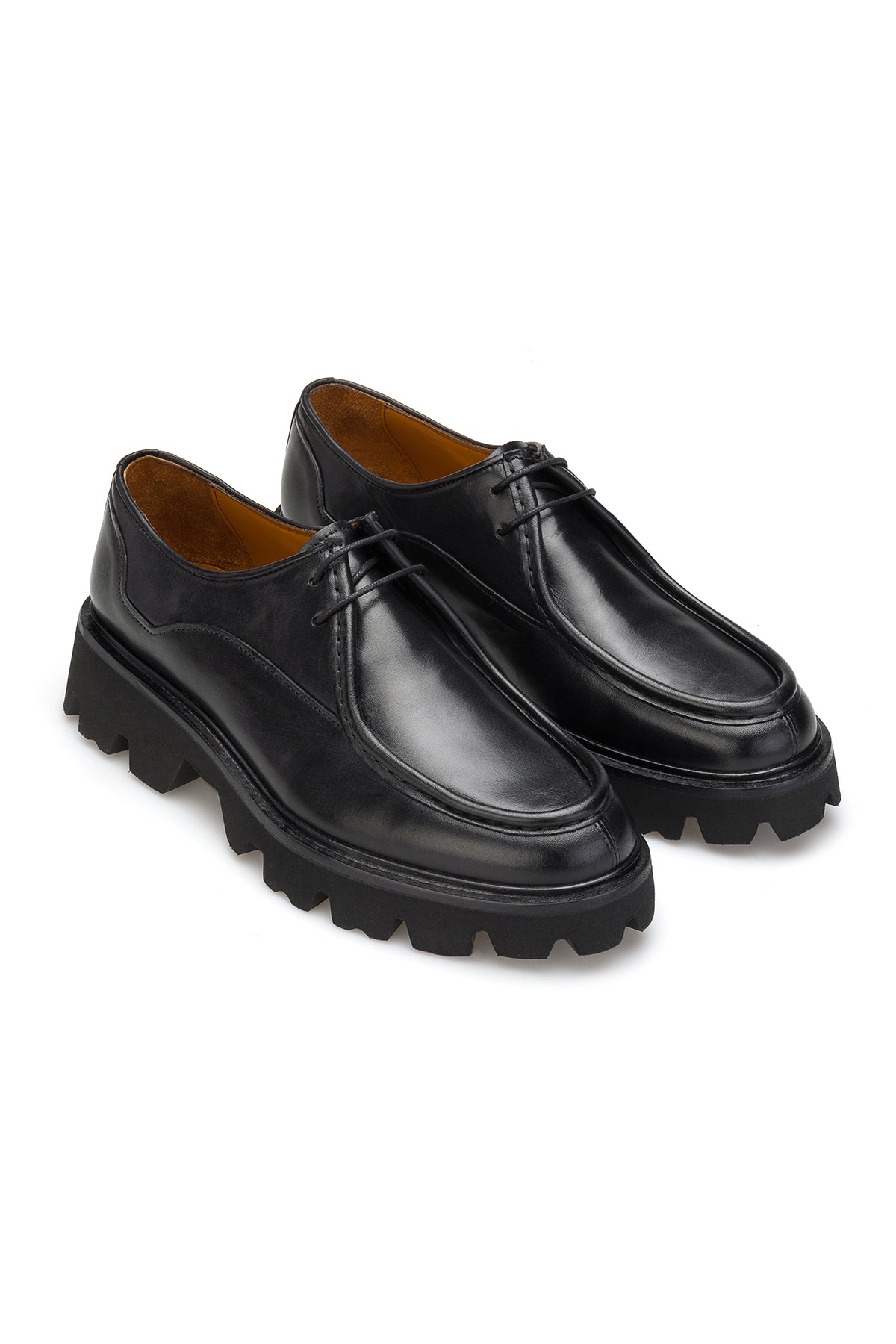Boots à lacets noires en cuir souple – vue de face avec semelle EVA visible