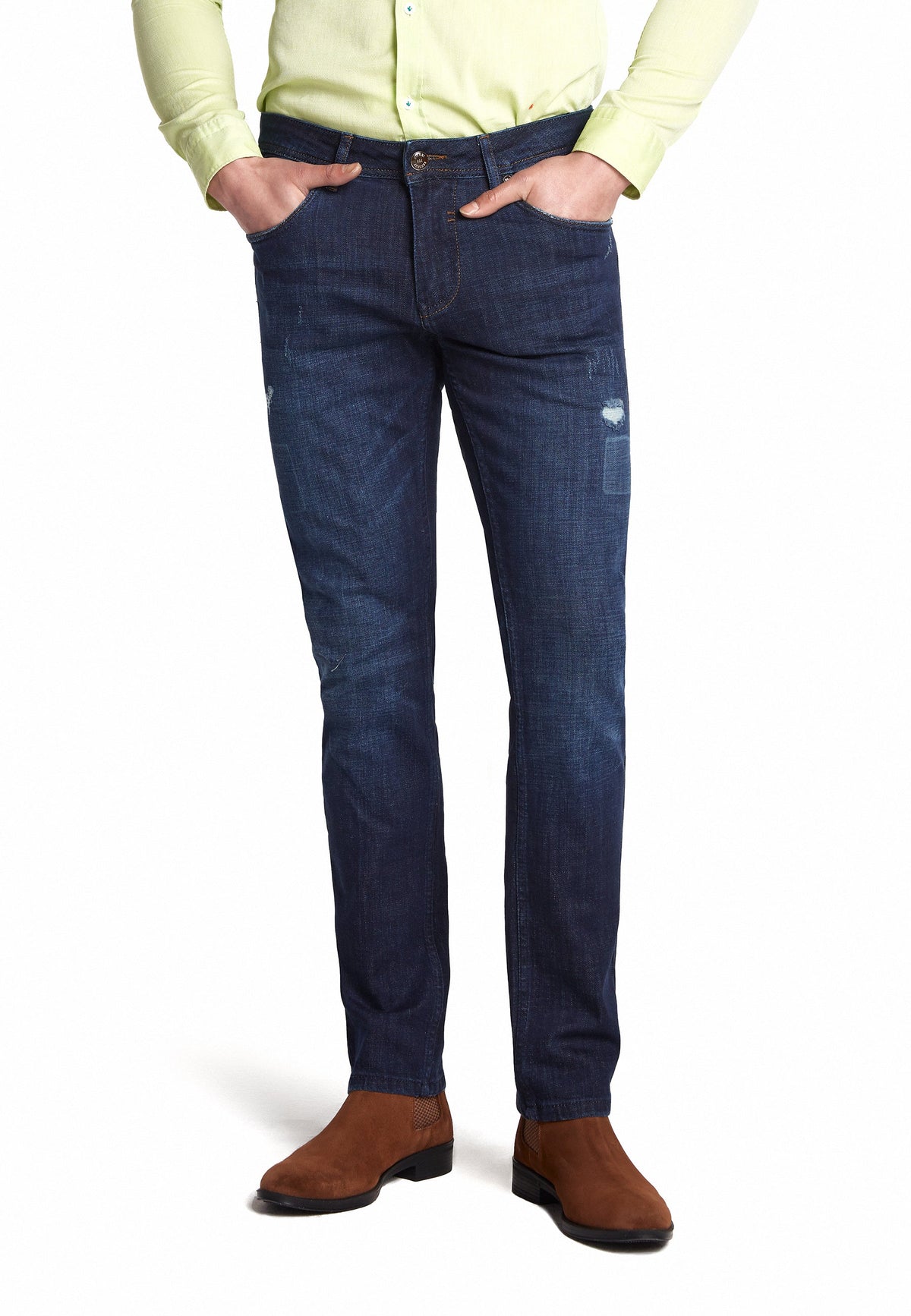 Gros plan sur la texture du tissu en denim et la ceinture élastique du jean