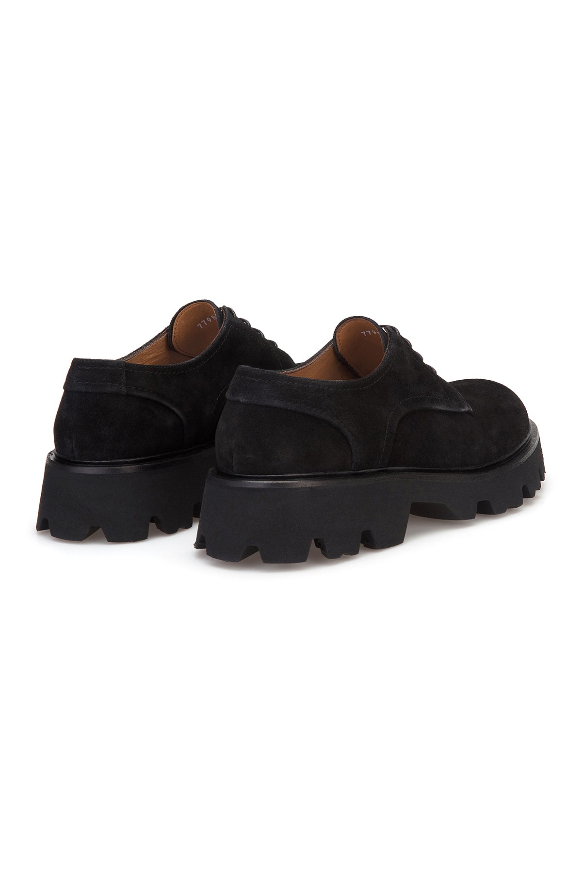 Detailaufnahme der stoßdämpfenden EVA-Sohle der Navy-Blue Wildleder Schuhe.