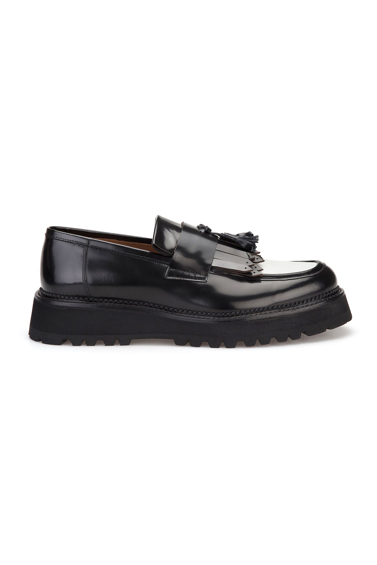 Side profile of the loafer highlighting the robust rubber tread.