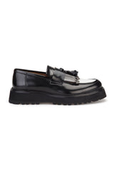 Side profile of the loafer highlighting the robust rubber tread.