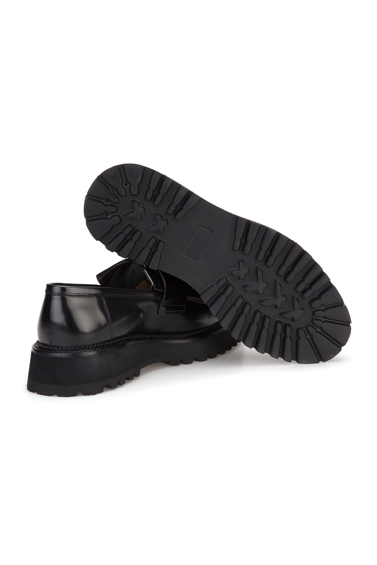 Lifestyle image of the loafer worn on a man's foot, ready for business attire.