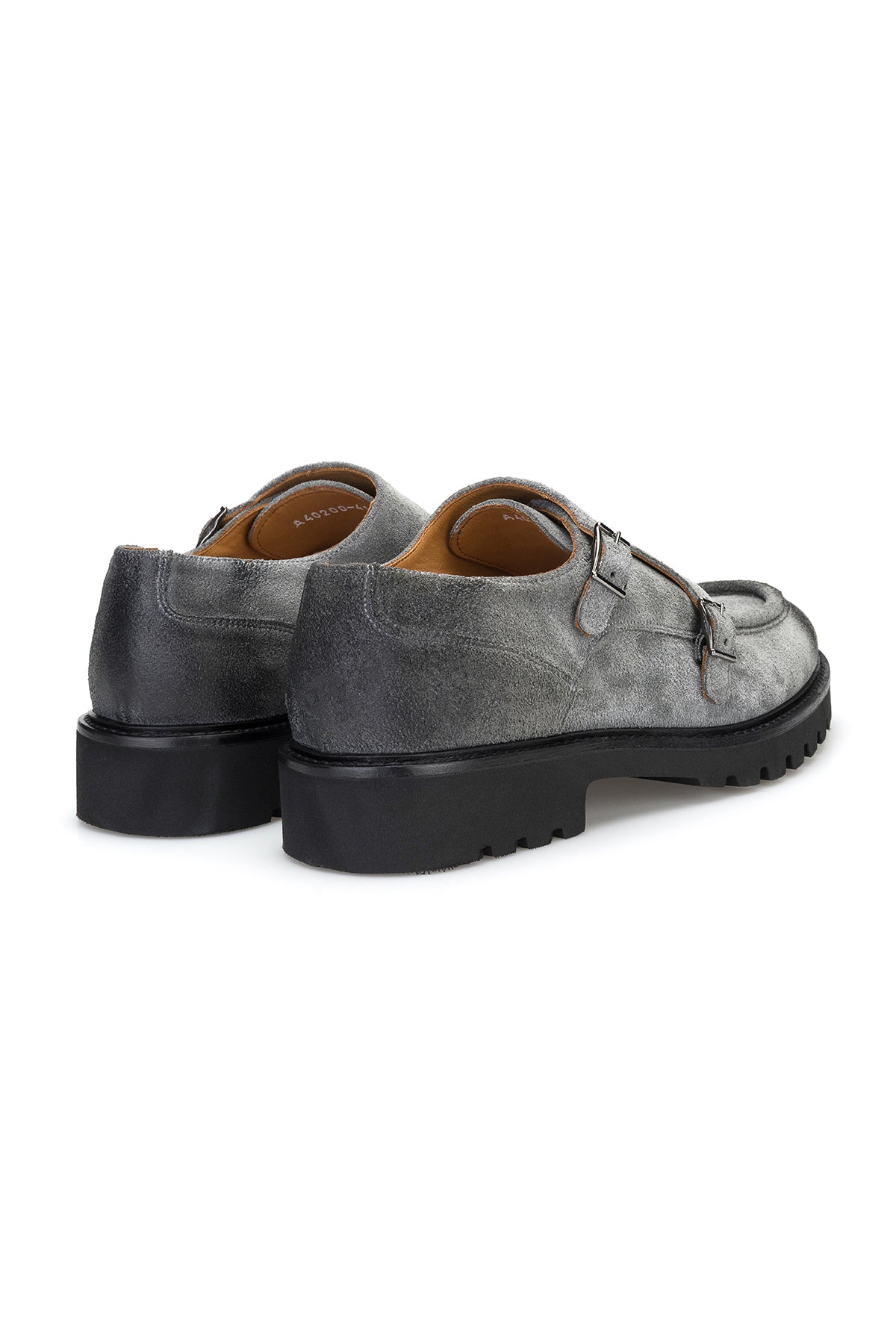 Schuh von hinten – Double Monk Verschluss in Grau, stilvoller Silhouette.