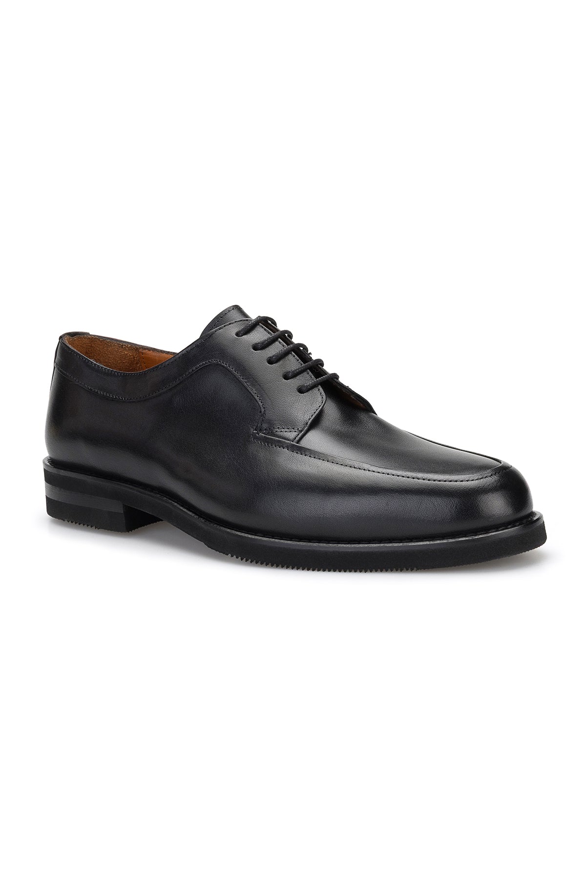 Close‑up of the EVA sole on the black business shoe, showcasing its lightweight construction.