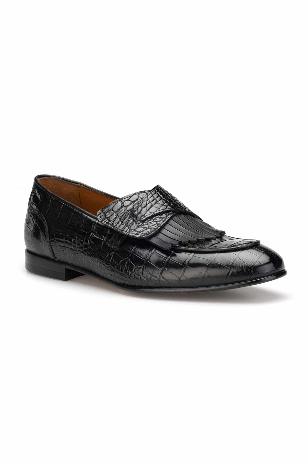 Vue arrière du mocassin, mettant en valeur la construction slip-on.