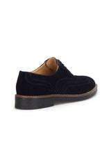 Nahaufnahme der Gummi‑Kautschuk‑Rubber‑Sohle des Oxfort Schuhs Dunkel Blue